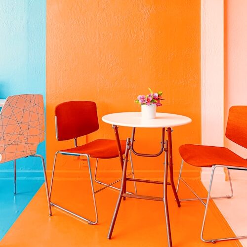 brown wooden table with chairs
