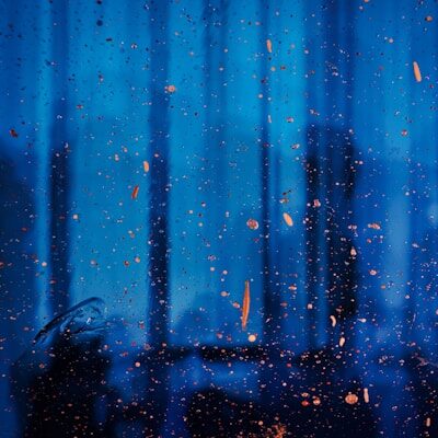 a window with rain drops on the glass