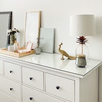 white and brown table lamp on white wooden table