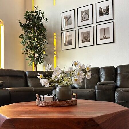 a living room with a couch and a table